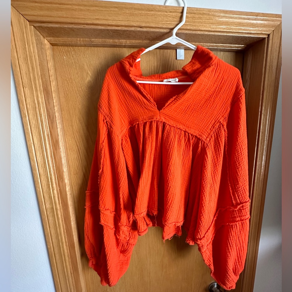 Coral, size medium, oversized long sleeve top.